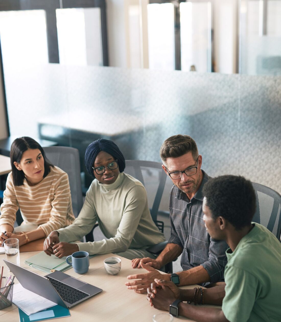 Relaxed team conversation in a modern office