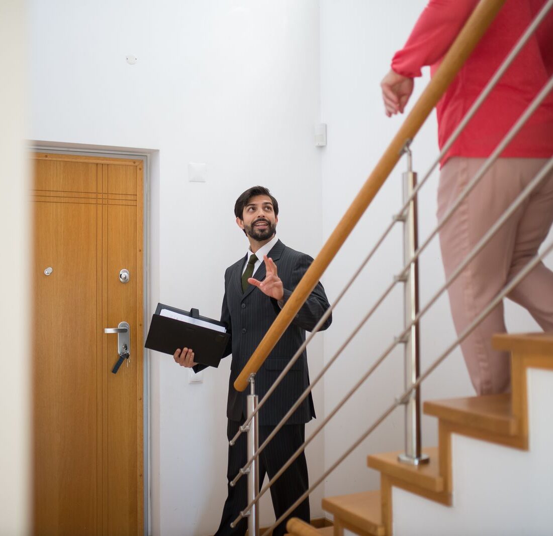 Consultant showing a landlord around a property